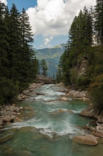 River ache in front of the Krimml waterfall, highest waterfall in Europe, Hohe Tauern National