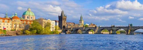 Panorama of old town with Charles Bridge on Vltava river and Old Town Bridge Tower, famous tourist