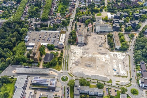Aerial view, town hall and town hall square as well as construction site with demolition of the