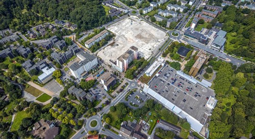 Aerial view, town hall and town hall square as well as construction site with demolition of the