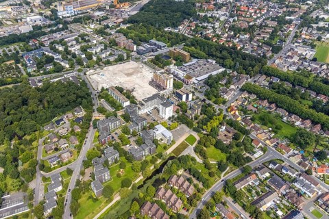 Aerial view, town hall and town hall square as well as construction site with demolition of the