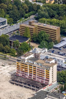 Aerial view, town hall and town hall square as well as construction site with demolition of the