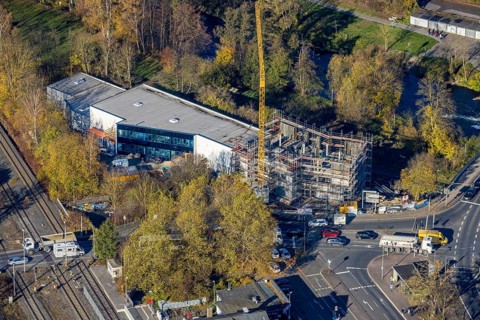 Aerial view, construction site with extension Eglo Leuchten Handels GmbH in the district Neheim in