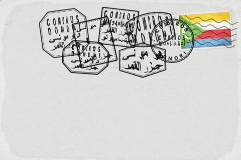Comoros Vintage Postcard with Flag Stamp and City Postmarks