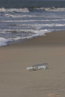DEU, Germany, Sylt, 05.03.2004, beach shot on Sylt. An empty bottle is lying on the beach.