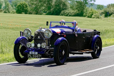 A blue classic car on a country road on a sunny day, classic car, car race, Mille Miglia, 1000