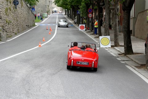 No. 279, Mercedes-Benz 300 SL W 198, model year 1954, red vintage convertible driving on a road