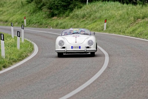 White Porsche convertible classic car on a winding road, classic car, car race, Mille Miglia, 1000