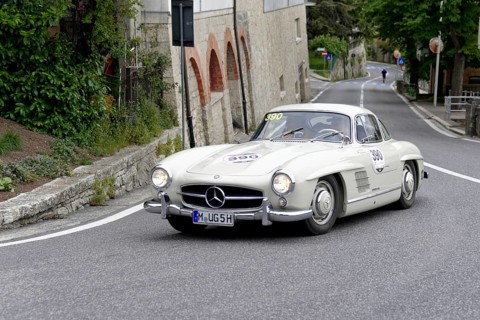 No.390, Mercedes-Benz 300SL W 198, model year 1955, White Mercedes vintage car driving on a winding