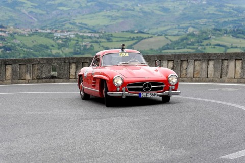 No. 334, Mercedes-Benz 300 SL W 198, model year 1955, Red Mercedes vintage car on a winding road in