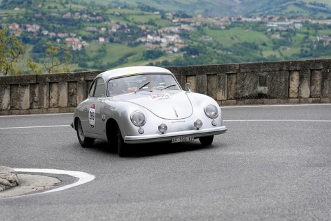 No. 269, Porsche 356 1500, model year 1953, silver classic car driving on a winding road in a hilly