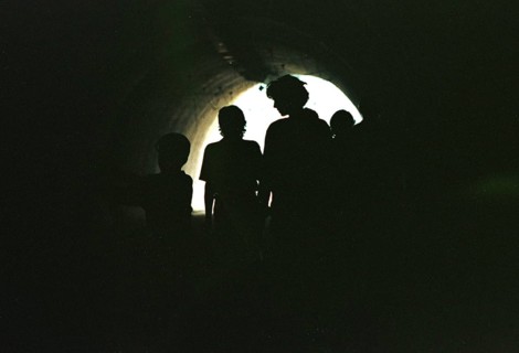 BIH, Sarajevo, 01.09.1995 -- Passers-by walk through an underpass in Sarajevo. During the war
