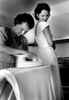 DEU, Westerburg, 09.09.1999 -- Mother of the bride irons the last wrinkles out of the bride's dress
