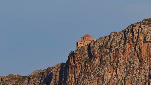 Orhodox church of Hagia Sophia, small chapel on a rocky mountain in the sun, Monemvasia,