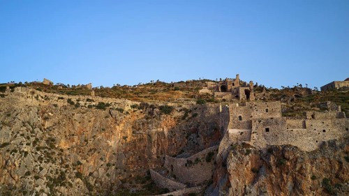 Drone shot, Old rock castle rising above the coastal landscape, Monemvasia, Monemvassia, Malvasy,