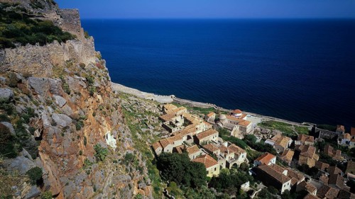 Coastal panorama with villages and cliffs falling down to the vast blue sea, Monemvasia,
