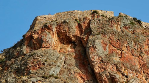 Dramatic rock formation rising against blue sky, Monemvasia, Monemvassia, Malvasy, Byzantine small