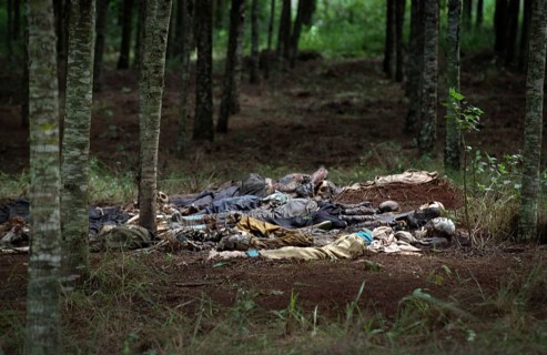 RWA Rwanda Nyamata Victims of the genocide lie in a wooded area not far from Nyamata south of the