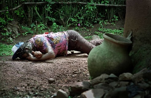 RWA Rwanda Kigali A dead Tutsi lies on the edge of a house on the outskirts of the Rwandan capital.