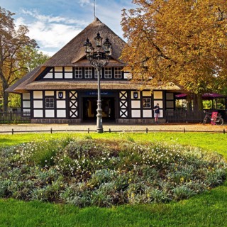 Entrance to Dahlem-Dorf subway station, thatched half-timbered house in the style of a North German