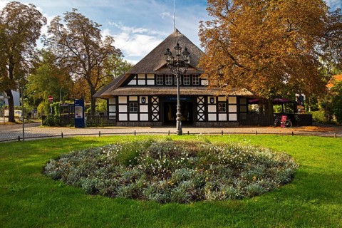 Entrance to Dahlem-Dorf subway station, thatched half-timbered house in the style of a North German