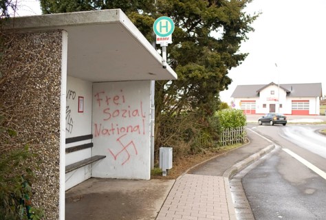 DEU Caan National Socialist graffiti on the wall of a bus stop in Caan, a village near the city of