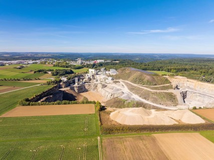 Scenic view of a quarry surrounded by natural fields and forests, Nagold, Black Forest, Germany