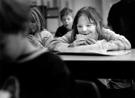 DEU, Meudt, 07.04.2000 -- Student eating lunch in class. -- Â© Karsten Thielker