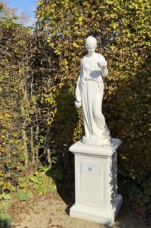 Statue of in Greek mythology goddess of youth Hebe Roman goddess Iuventas of male youth holding a