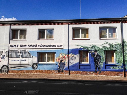 DEU Germany Germany Leipzig Wall painting as an advertisement for a security company in Leipzig