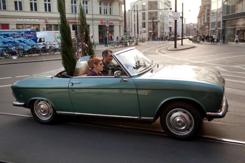 DEU Berlin convertible with plants on Rosenthaler Straße in Berlin Mitte Germany Berlin convertible