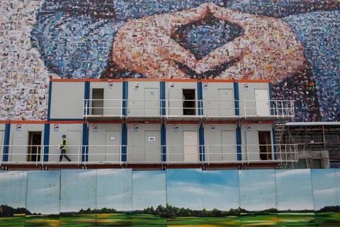 DEU Germany Germany Berlin large poster with Angela Merkel's hands, Merkel diamond, on a building