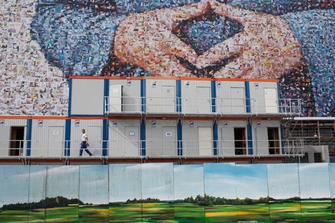 DEU Germany Germany Berlin large poster with Angela Merkel's hands, Merkel diamond, on a building