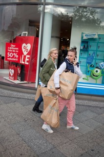 DEU Germany Germany Berlin Young girls with Primark shopping bags on Kurfürstendamm in Berlin