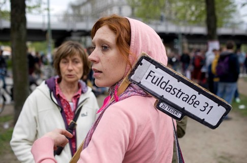 GERMANY A woman with a sign of protest at the May 1 rally in Kreuzberg. Germany Berlin A woman