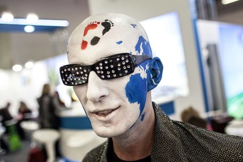 DEU Germany Germany Berlin International Tourism Exchange ITB. A man with a painted head, on which
