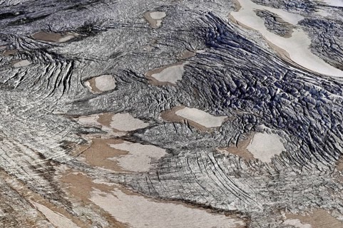 View from the Télécabine Panorama Railway of the glacial crevices of the Glacier du Géant,