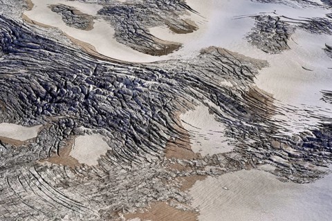 View from the Télécabine Panorama Railway of the glacial crevices of the Glacier du Géant,