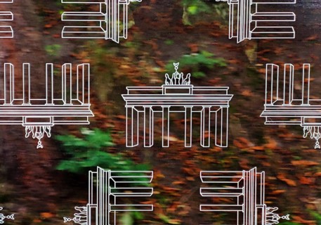Subway window covered with Brandenburg Gate pattern film to protect against scratching while