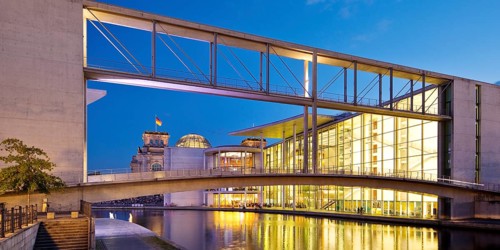 Bridge between Marie-Elisabeth-Lüders-Haus and Paul-Löbe-Haus with the river Spree in the evening,