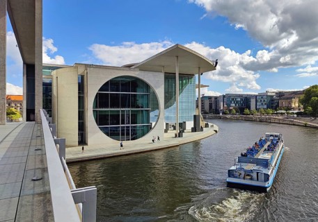 Marie-Elisabeth-Lüders-Haus with the river Spree and sightseeing boat, government district,