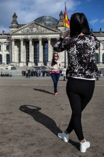 DEU Germany Germany Berlin Kazakh tourists take pictures of themselves in front of the Reichstag