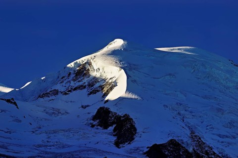 Snow-capped Dome du Goûter, Chamonix-Mont-Blanc, Haute-Savoie, France