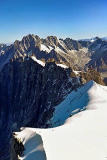 View from the Aiguille du Midi mountain station observation deck of the mountains Aiguille Vert,
