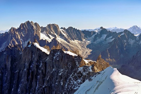 View from the Aiguille du Midi mountain station observation deck of the mountains Aiguille Vert,
