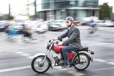 DEU Germany Germany Berlin Two-wheeled cyclists on a Simpson, an East German motorcycle company,