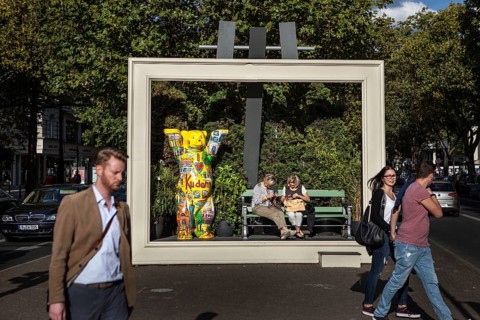 DEU Germany Germany Berlin Passers-by pass by an oversized picture frame with a Berlin bear on the