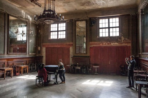 DEU Germany Germany Berlin Visitor films two woman playing a piano in the Hall of Mirrors at