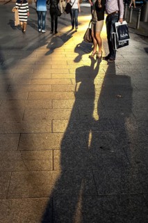 DEU Germany Germany Berlin Passers-by cast their shadow on Berlin's popular shopping street,