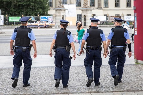 DEU Germany Germany Berlin Four policemen mesh across Bebelplatz